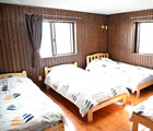 古民家OKINAWAのベッドルーム